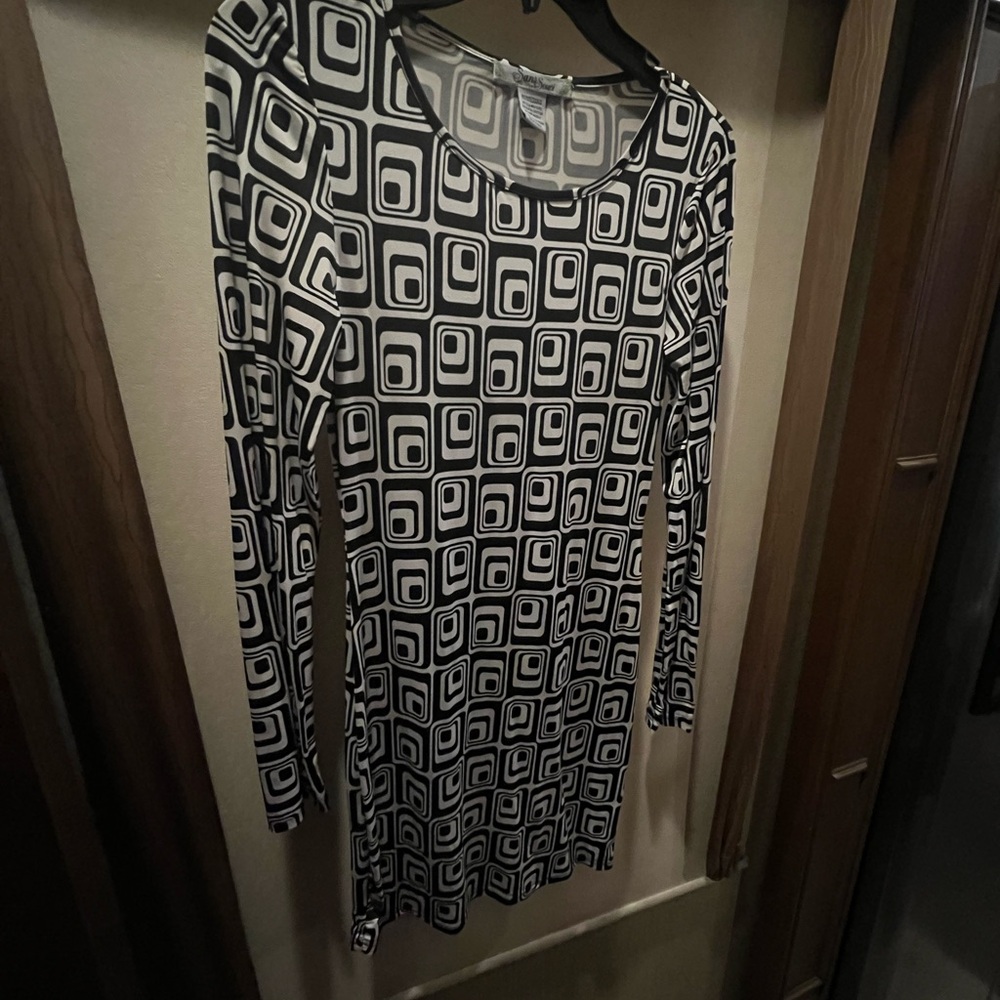 Black and white fitted long sleeve dress